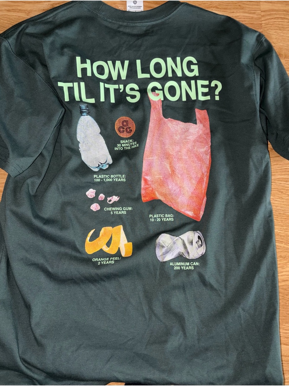 Nike Short Sleeve Tee in Black with Green and Multi-Color Graphic